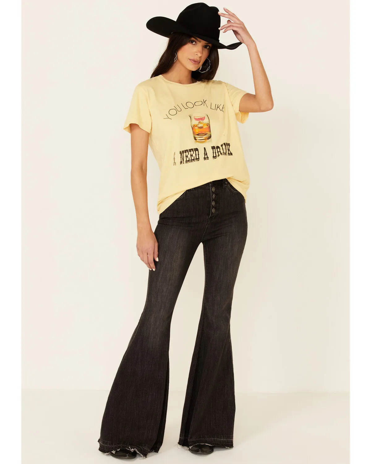 Product Name:  Goodie Two Sleeves Women's You Look Like I Need A Drink Graphic Short Sleeve Tee